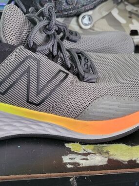 New Balance Men’s Gray Mesh Running Shoes with Yellow-Orange Accent